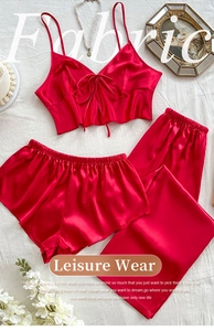 Three-piece red silk pajama set with camisole top and matching shorts and trousers