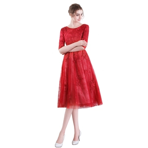 Elegant red lace evening dress with floral embroidery and classic round neck design