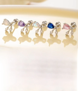 Detailed size specifications for titanium steel bow earrings with multi-color zircons