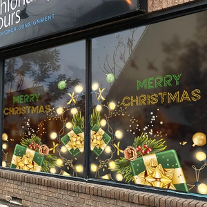 Christmas window decals with green gift boxes and Merry Christmas lettering for glass decor