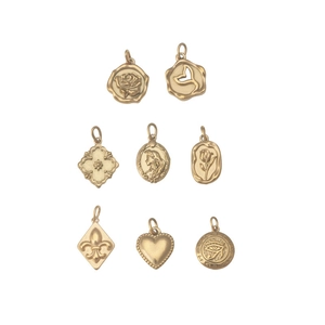 Set of 8 gold vintage charms featuring mermaid, flowers, and heart for DIY jewelry making