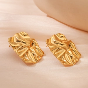 Chic 18K gold plated irregular geometric square stud earrings on beige fabric