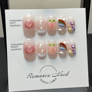 Unghie finte fatte a mano rosa sfumato con decorazioni 3D a pesca, arcobaleno e fiori