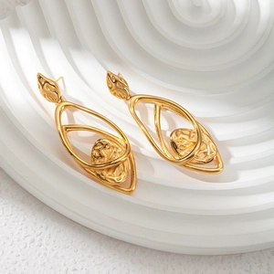 Artistic golden hollow irregular earrings with multi-layered nested organic shapes