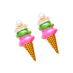 Macro detail of colorful ice cream cone earrings with enamel finish and white pearls