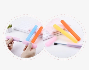Close-up of portable toothbrush cases in multiple colors with breathable vent holes