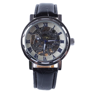 Detailed close-up of a men's mechanical skeleton watch with Roman numerals and leather strap