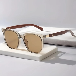 Retro polygon sunglasses with tea lenses, grey frames and dark wood grain temples