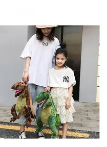 Detailed view of plush dinosaur backpack for kids and adults with adjustable straps