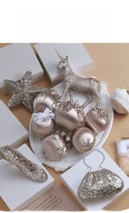 Detail of luxury champagne gold Christmas ornaments with pearls, sequins and glitter texture