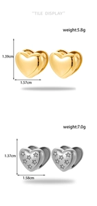 Macro view of gold and silver heart-shaped hoop earrings with size and weight dimensions