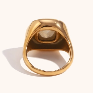 Macro detail of 18K gold plated ring featuring a square-cut moonstone with polished finish