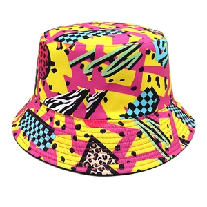 Retro geometric bucket hat featuring colorful leopard and zebra print patterns on twill canvas