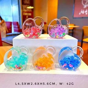 Detail view of heart lock sand bottles with measurements 4.5x2.6x5.6cm and five colors