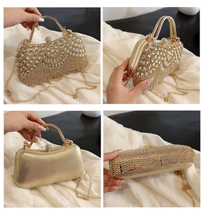 Detail view of gold rhinestone evening clutch bag with crystal scale patterns and chain strap