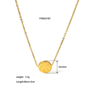 Detail of 18K gold plated stainless steel sun and moon pendant necklace with dimensions