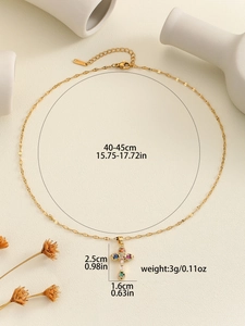Detailed size specifications for a gold cross necklace with multicolored zircon stones