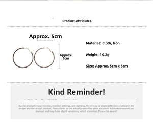 Detail view of 5cm geometric hoop earrings with fabric wrap and iron material specs