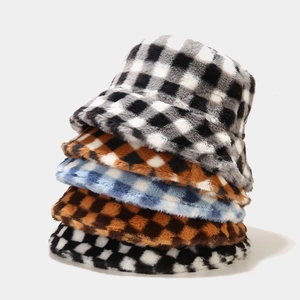 Fashionable checkerboard plush bucket hats in black, brown, and blue stacked colors