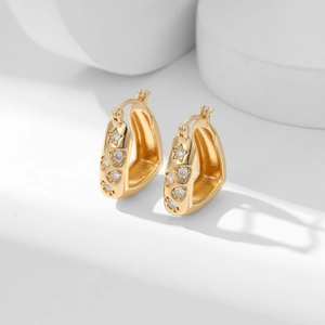 Elegant gold square hoop earrings with cubic zirconia stones on a clean white background