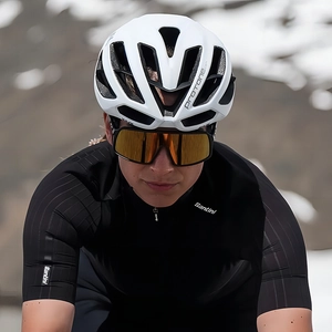 Outdoor cycling goggles with orange lenses and white helmet for professional sports