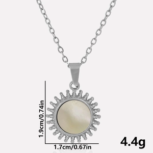 Macro shot of sun pendant showing precise dimensions 1.9cm and weight 4.4g on silver chain