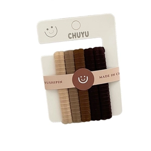 5-piece set of ribbed elastic hair ties in neutral earth tones on display card