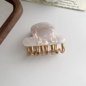 Elegant small pearlescent white acetate and gold metal hair claw clip for women