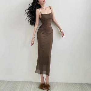 Detail of dark brown midi dress featuring side ruching and slim fit sleeveless design