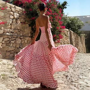 Chic strapless backless maxi dress with red polka dots and tiered ruffle hem for vacation