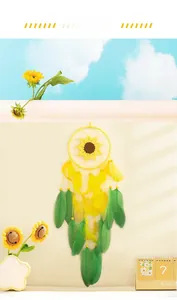 Detailed handmade crochet sunflower dreamcatcher with soft yellow feathers and beads