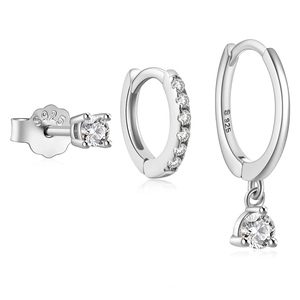 Macro view of S925 sterling silver evil eye earring set with clear gemstones and 925 hallmarks
