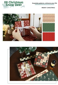 Detail of vintage kraft Christmas wrapping paper featuring reindeer and snowflake patterns