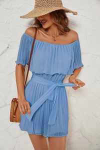 Detail of light blue off-shoulder pleated romper with matching waist tie for summer fashion