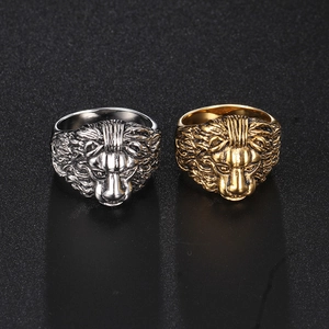 Detailed comparison of gold and silver hip hop lion head rings in titanium steel