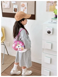 Pink unicorn crossbody bag for girls with glitter sequins and rainbow cartoon design