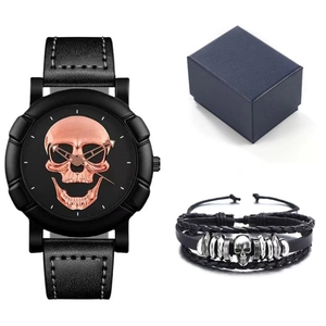 Close-up of men's black skull watch and braided leather bracelet in a gift box