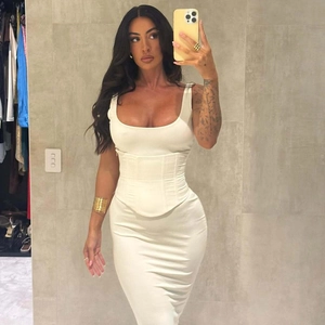 Detail of white corset top with boning and matching slim fit midi skirt set