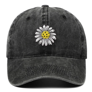 Vintage washed black baseball cap featuring white daisy embroidery and a curved brim