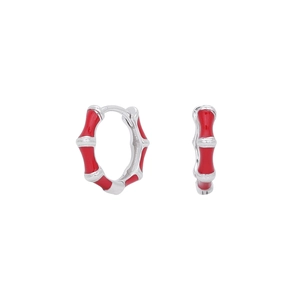 Macro detail of red enamel bamboo style s925 silver hoop earrings on white background