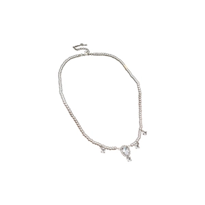 Elegant beaded pearl necklace with luxury diamond water drop pendant on white background