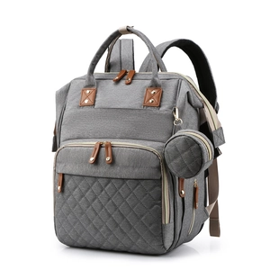 Gray multifunctional large capacity diaper backpack with round pouch on white background