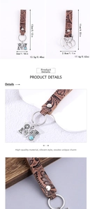 Detail of bohemian brown leather keychain with turquoise beads and sunflower metal charms