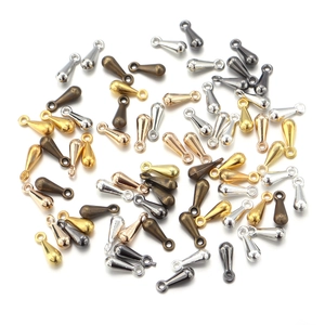 Close-up of multi-color teardrop alloy pendants for DIY necklace extension chains