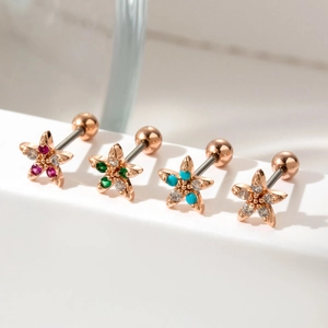 Star-shaped rose gold cartilage earrings with colorful zircon stones and ball screw back