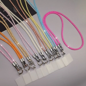Colorful glitter crossbody phone lanyards in pink, gold and blue with metal buckles
