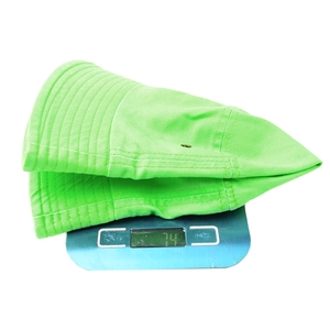 Neon green fisherman bucket hat made of cotton canvas weighing 74g for outdoor sun protection