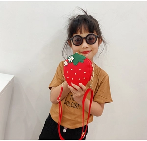 Cute strawberry-shaped crossbody bag for girls featuring daisy floral details and chain strap