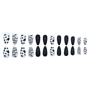 24pcs long almond press-on nails featuring black and white zebra stripes and cow patterns