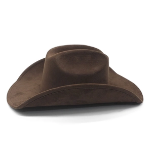 Detail of classic brown suede western cowboy hat with wide brim and dented top crown